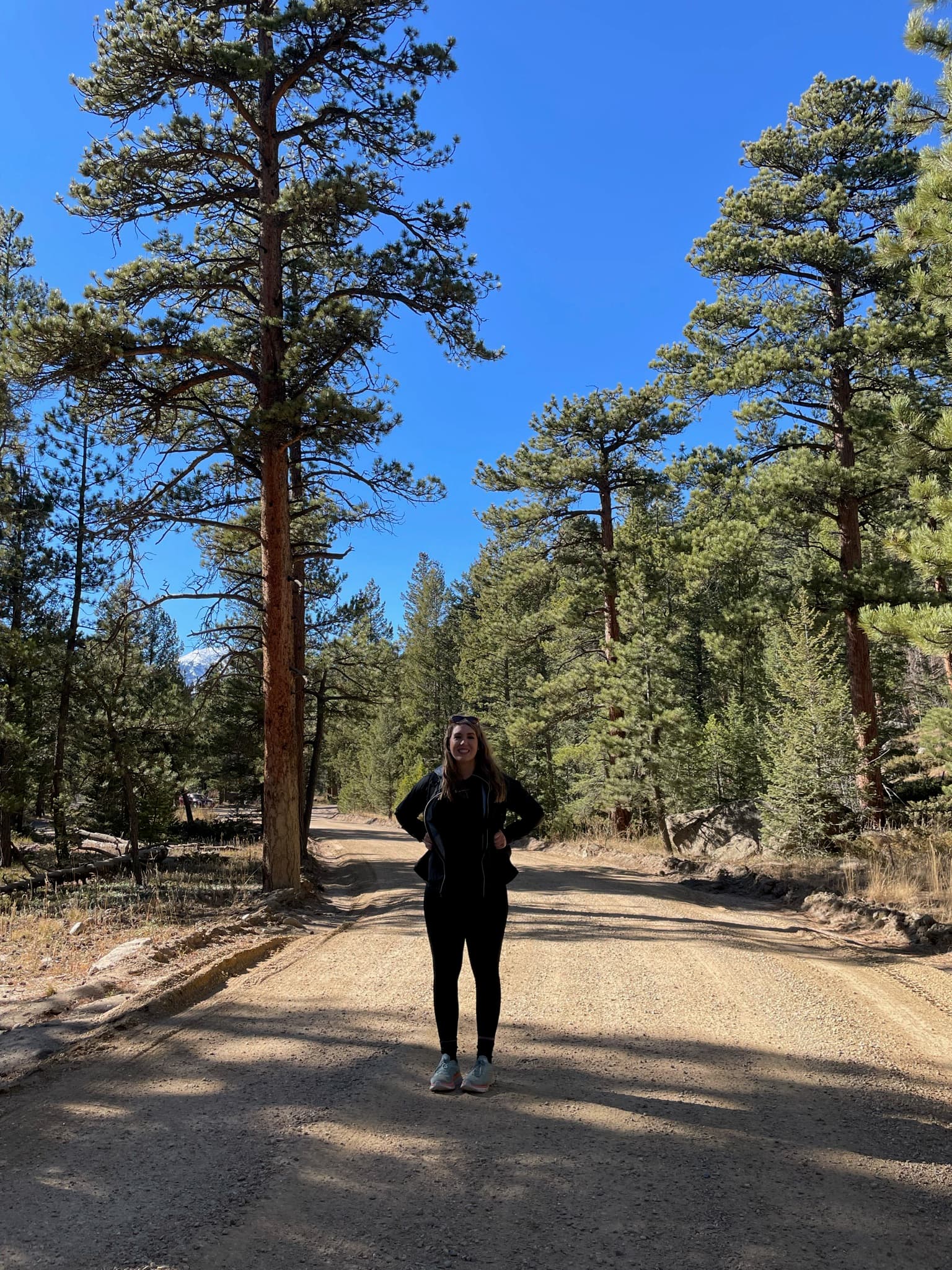 Kristen McLaughlin outdoors at Steadfast Roots Counseling Co.